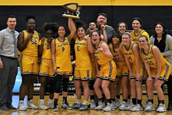 A group of people in yellow uniforms; women's basketball